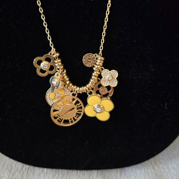 henri bendel Jewelry - Vintage Gold Henri Bendel Flower Petals Charm Necklace